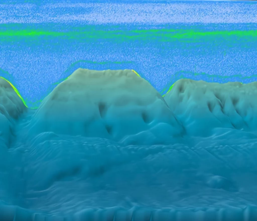 3D rendering of a seafloor scan showing detailed geological features and topography, illustrating marine geophysical survey results including sonar and seismic data interpretation.